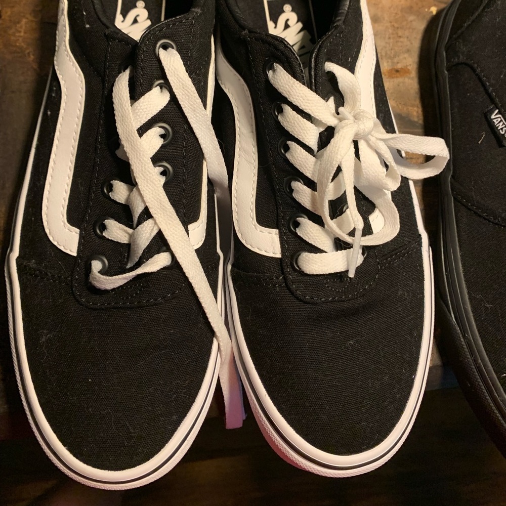 Black Vans.